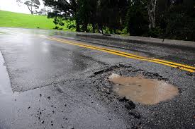pothole. road