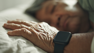 Woman sleeping w/ apple watch
