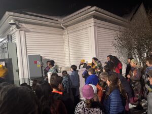 Jewish Community of Amherst Celebrates Hanukkah with Energizing of Solar Canopy