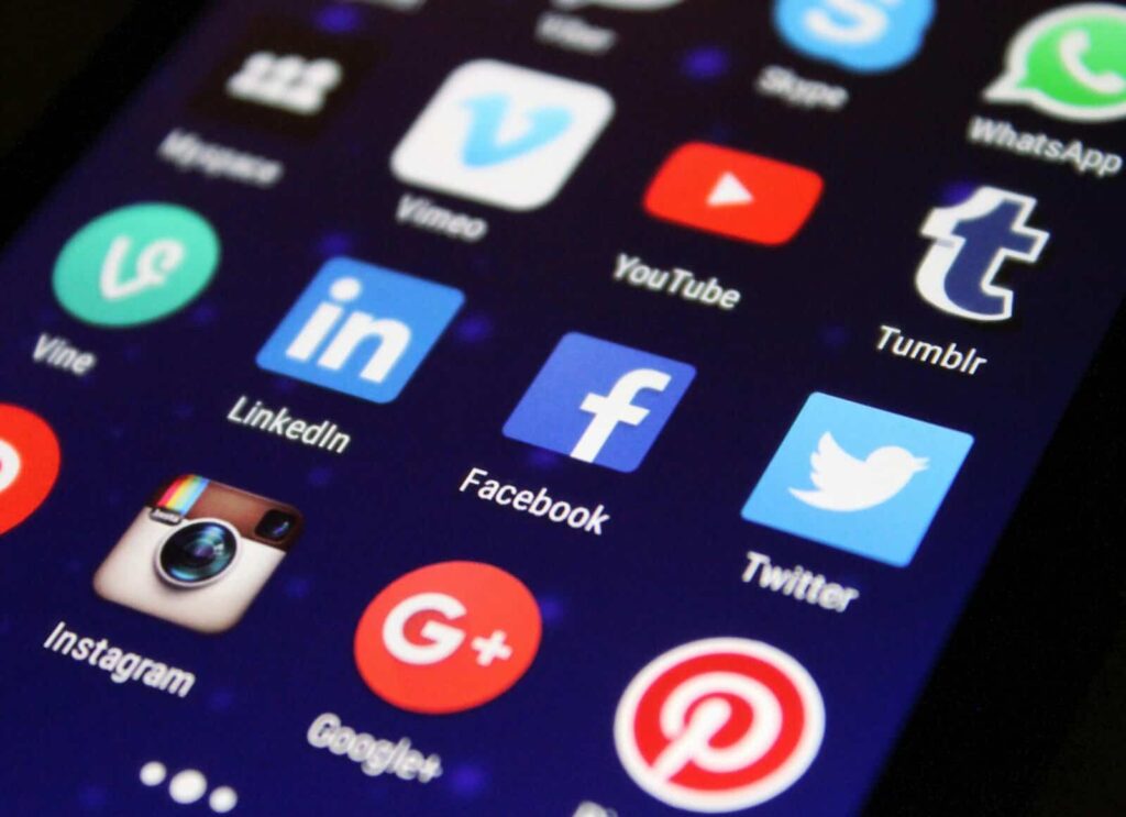 close-up-of-a-smartphone-screen-showing-various-social-media-app-icons-such-as-facebook-and-twitter.-267350-scaled