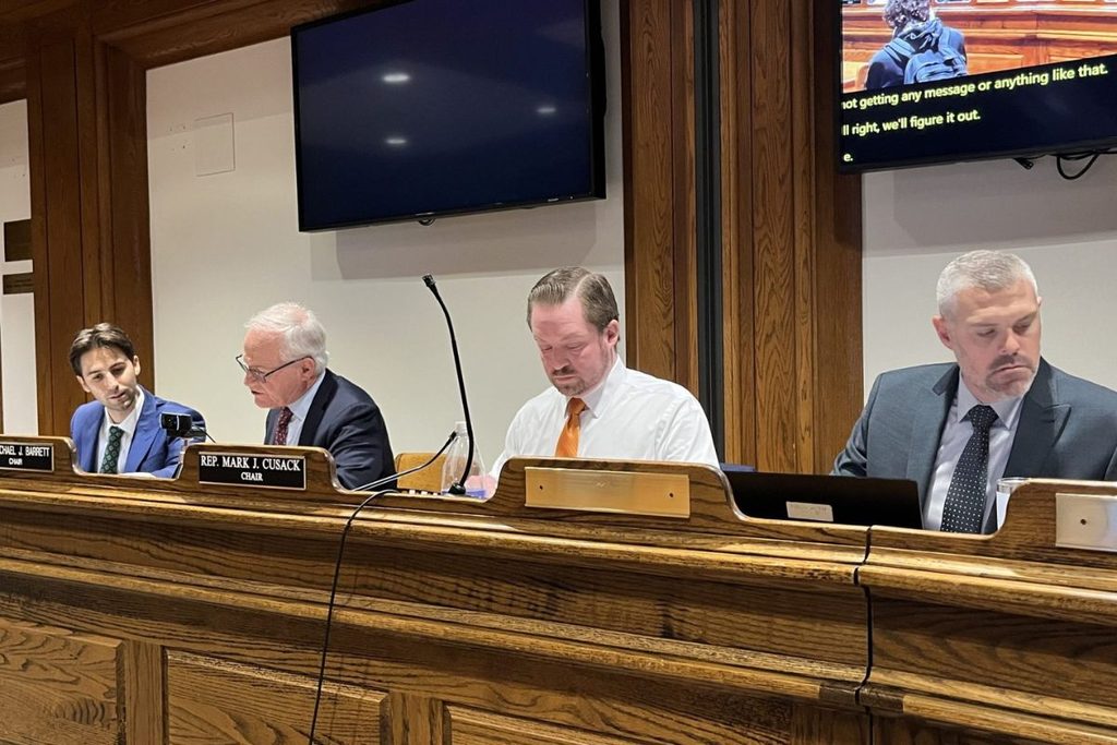Rep. Mark Cusack, chair of the House energy committee (center) presides over a hearing alongside Sen. Michael Barrett, head of the Senate energy committee. (Jordan Wolman/CommonWealth Beacon)